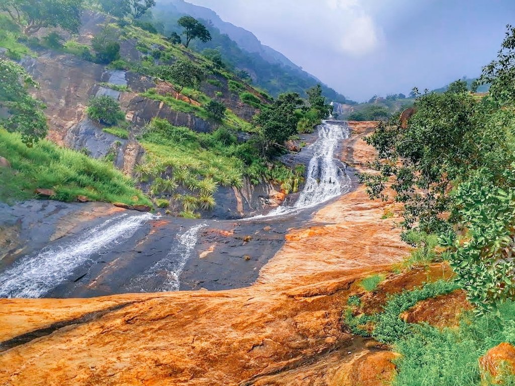 Ayyanar Falls is a beautiful natural waterfall located near Rajapalayam, surrounded by the lush greenery of the Western Ghats. It is a peaceful and scenic spot, perfect for families to relax after attending a function. The cool flowing water and fresh mountain air make it an ideal place to unwind and enjoy nature. A visit to this serene location adds a refreshing touch to your trip.